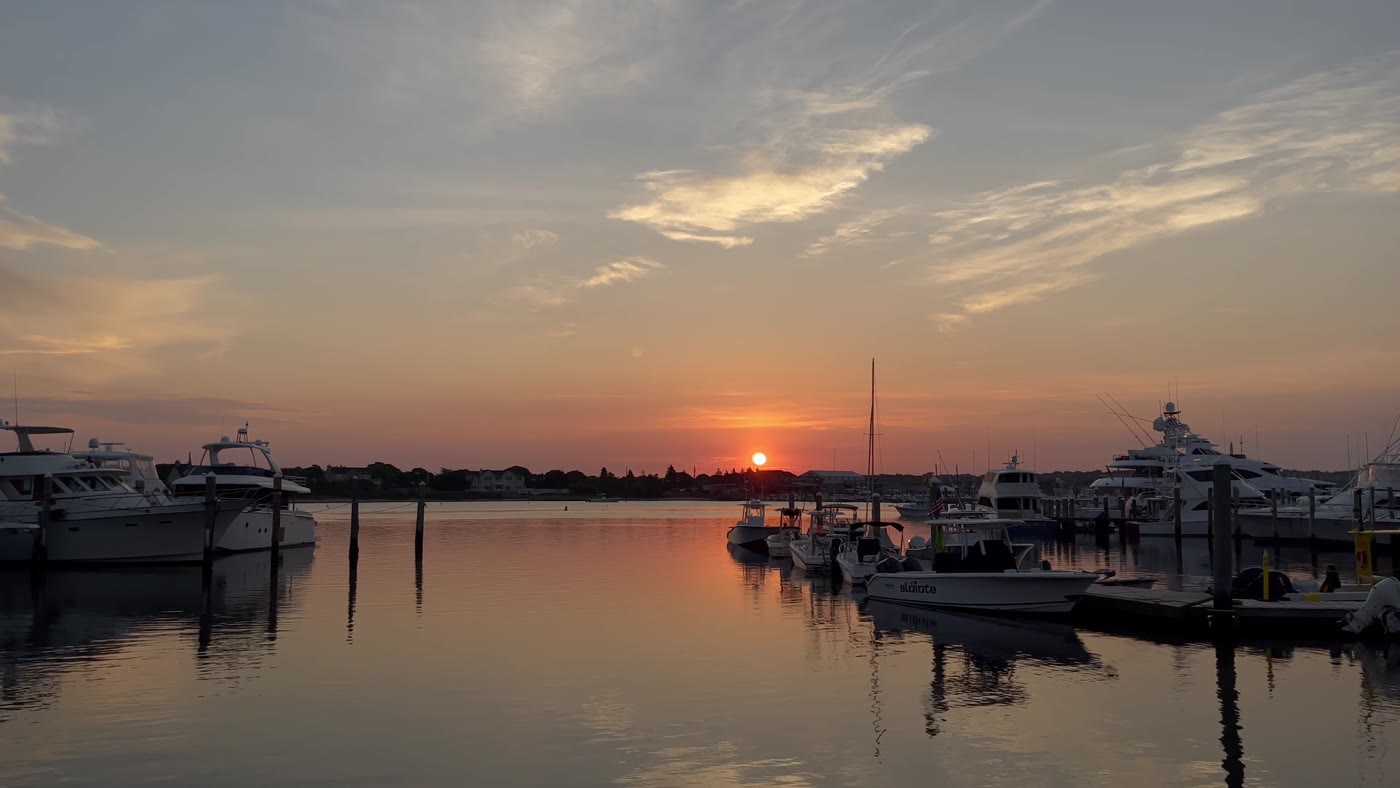 Boats and waterfront at sunset